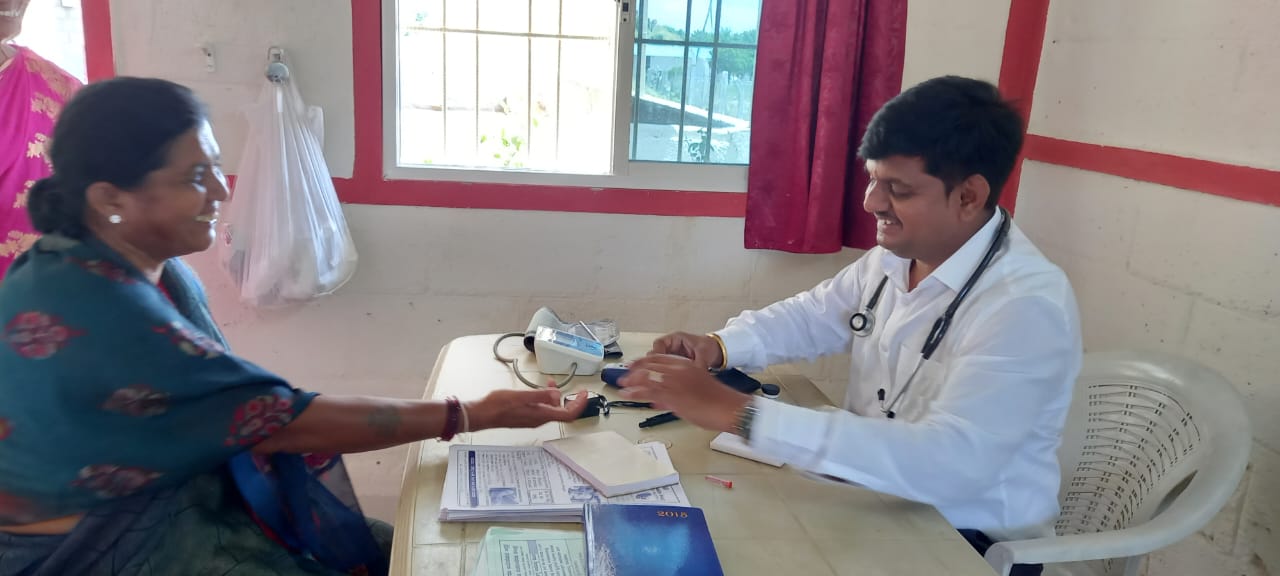 Dr. Santhosh with patient 1